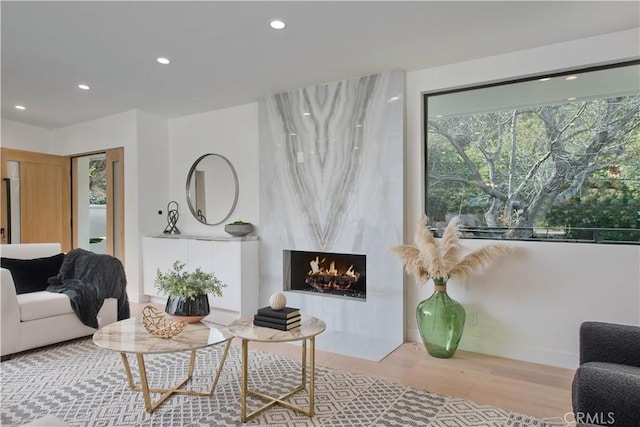 3920 Weslin Ave, Sherman Oaks, CA 91423 - living area with recessed lighting, wood finished floors, and a fireplace