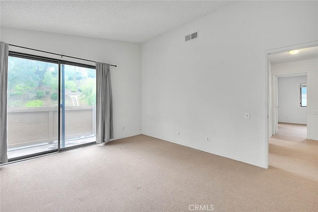 1207 Porto Grande Unit 1, Diamond Bar, CA 91765 - spare room with light carpet and a textured ceiling