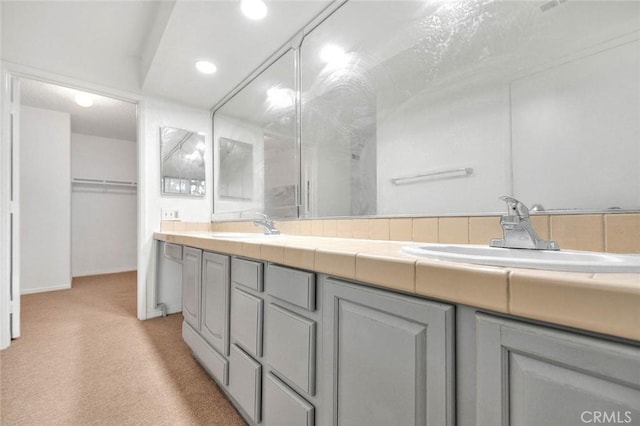1207 Porto Grande Unit 1, Diamond Bar, CA 91765 - full bathroom with double vanity, a spacious closet, and recessed lighting