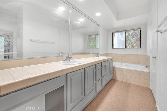 1207 Porto Grande Unit 1, Diamond Bar, CA 91765 - full bathroom with double vanity, tiled tub, and recessed lighting
