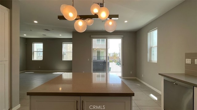 2296 Synergy, Irvine, CA 92614 - kitchen with healthy amount of natural light, open floor plan, white cabinetry, and recessed lighting