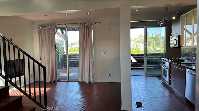 1419 Angelus Ave, Los Angeles, CA 90026 - doorway with stairs, dark wood-type flooring, and recessed lighting