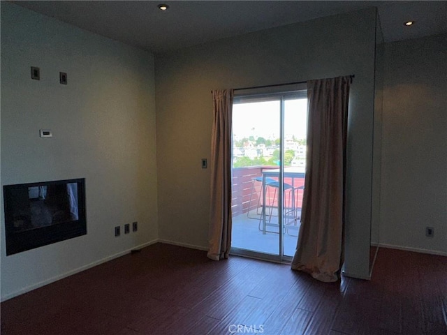 1419 Angelus Ave, Los Angeles, CA 90026 - unfurnished room with baseboards, wood finished floors, and recessed lighting