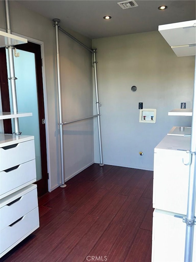 1419 Angelus Ave, Los Angeles, CA 90026 - washroom featuring dark wood-style floors, washer / dryer, recessed lighting, and baseboards