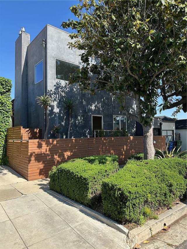 1419 Angelus Ave, Los Angeles, CA 90026 - view of home's exterior featuring fence and stucco siding