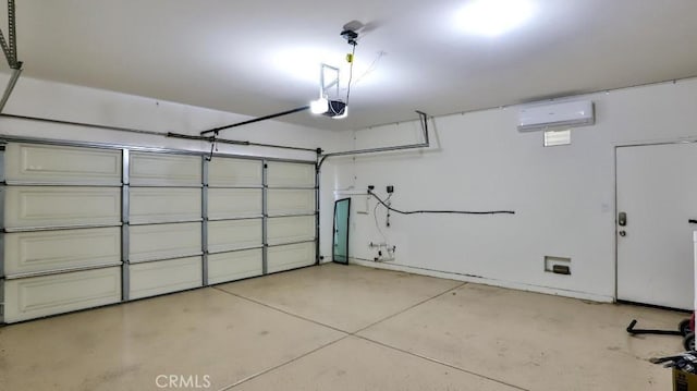 garage featuring a wall mounted air conditioner and a garage door opener