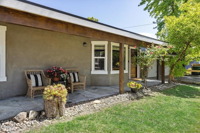 8730 Junipero Ave, Atascadero, CA 93422 - view of home's exterior with stucco siding and a yard