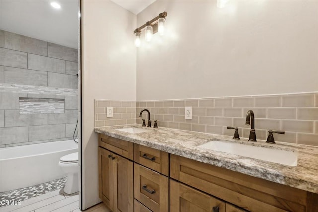 8730 Junipero Ave, Atascadero, CA 93422 - bathroom with toilet, decorative backsplash, and double vanity