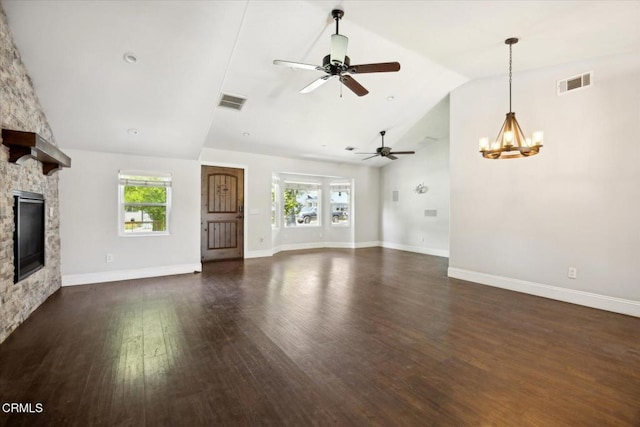 8730 Junipero Ave, Atascadero, CA 93422 - unfurnished living room featuring ceiling fan, a stone fireplace, plenty of natural light, dark wood-style flooring, and high vaulted ceiling