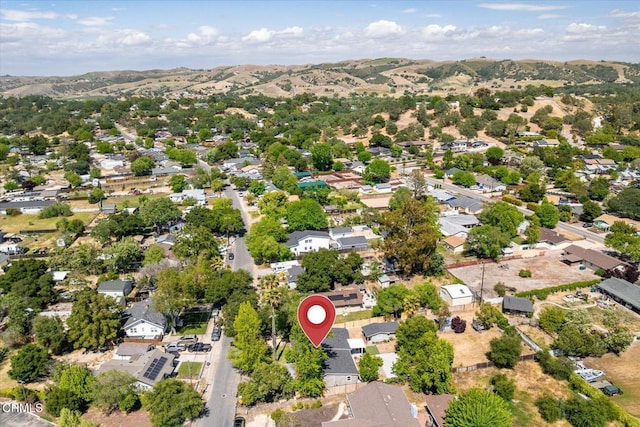 8730 Junipero Ave, Atascadero, CA 93422 - aerial overview of property's location featuring a mountainous background and nearby suburban area