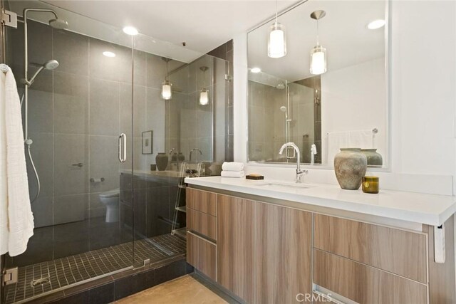 482 S Arroyo Pkwy Unit 408, Pasadena, CA 91105 - full bath with vanity, a stall shower, toilet, and tile patterned flooring