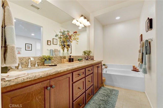 12474 Benton Dr Unit 2, Rancho Cucamonga, CA 91739 - full bath with tile patterned floors, a bath, double vanity, and recessed lighting