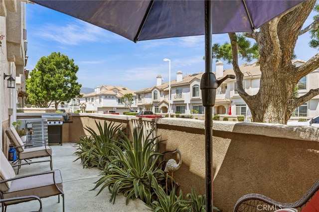 balcony featuring a residential view