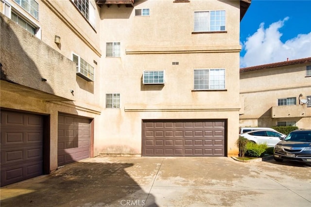 612 San Gabriel Blvd, Rosemead, CA 91770 - exterior space featuring an attached garage and driveway