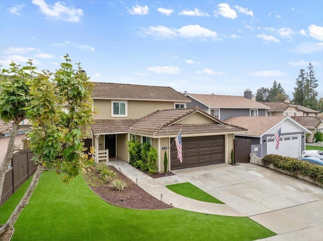 traditional-style house with a tiled roof, concrete driveway, a garage, and a residential view