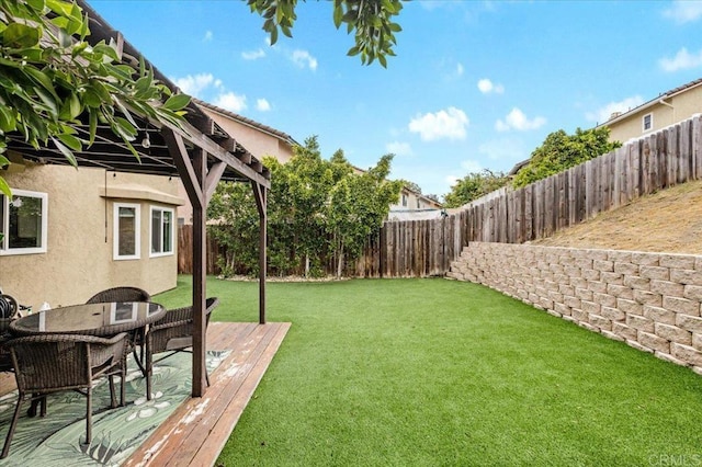 view of yard with a deck