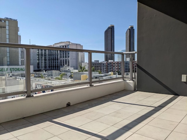 balcony featuring a view of city