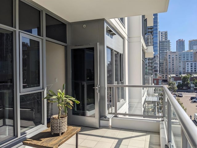 balcony featuring a skyline view