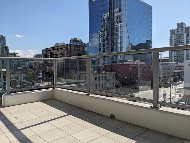 balcony featuring a city view