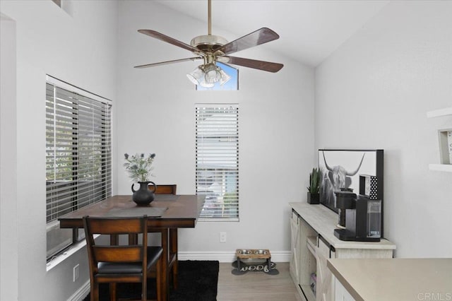 2135 E Valley Pkwy Unit 51, Escondido, CA 92027 - dining room with a ceiling fan, wood finished floors, and high vaulted ceiling