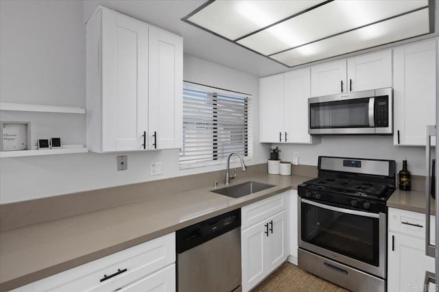 2135 E Valley Pkwy Unit 51, Escondido, CA 92027 - kitchen featuring stainless steel appliances and white cabinetry