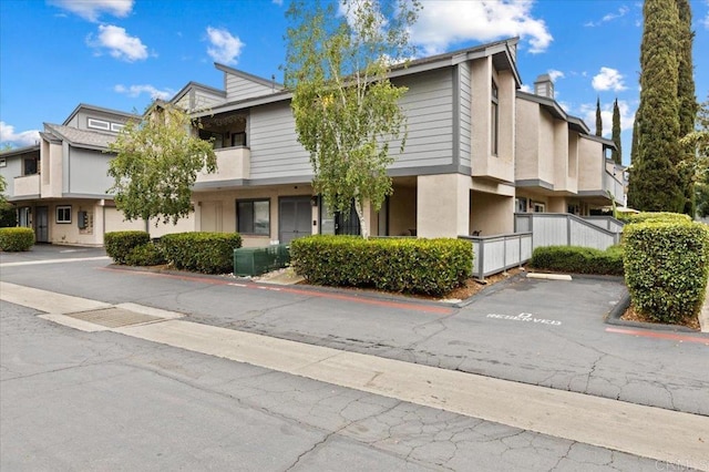 2135 E Valley Pkwy Unit 51, Escondido, CA 92027 - view of building exterior featuring uncovered parking