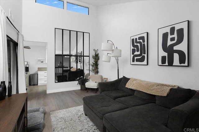 2135 E Valley Pkwy Unit 51, Escondido, CA 92027 - living area with wood finished floors and a high ceiling