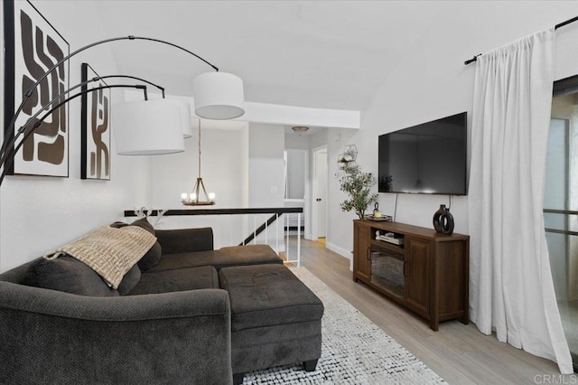 2135 E Valley Pkwy Unit 51, Escondido, CA 92027 - living area featuring wood finished floors and a chandelier
