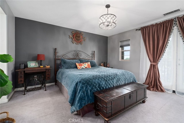 11905 Mendenhall Ln, Whittier, CA 90601 - carpeted bedroom with a chandelier and baseboards