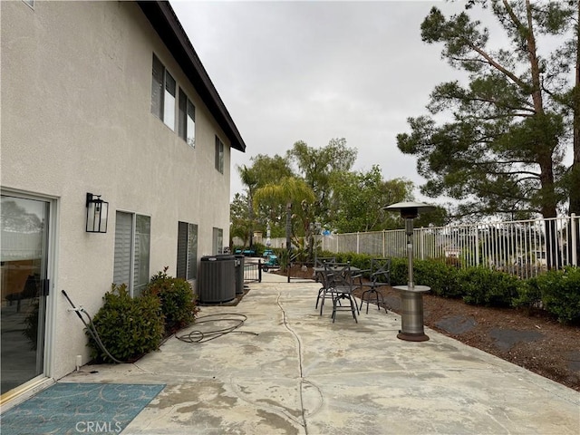 23 Ponte Sonata, Lake Elsinore, CA 92532 - view of patio with central AC unit and fence