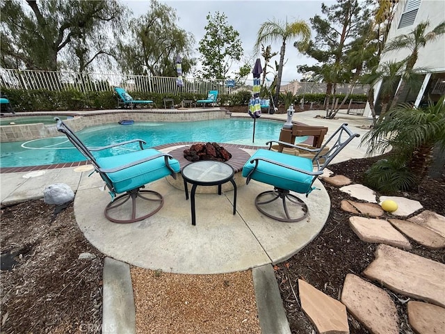 23 Ponte Sonata, Lake Elsinore, CA 92532 - view of swimming pool with fence and a patio area