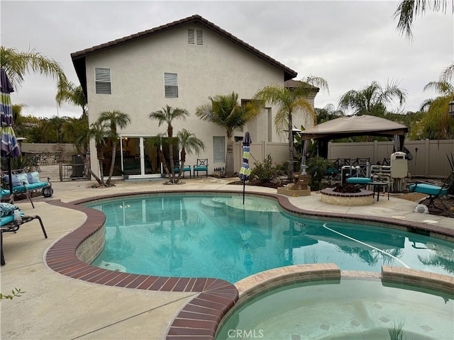 23 Ponte Sonata, Lake Elsinore, CA 92532 - view of pool with a gazebo, a pool with connected hot tub, a patio, fence, and central AC unit