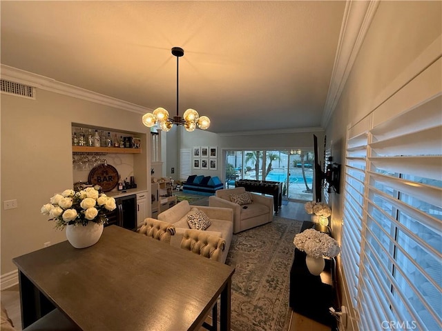 23 Ponte Sonata, Lake Elsinore, CA 92532 - dining room featuring crown molding and a chandelier
