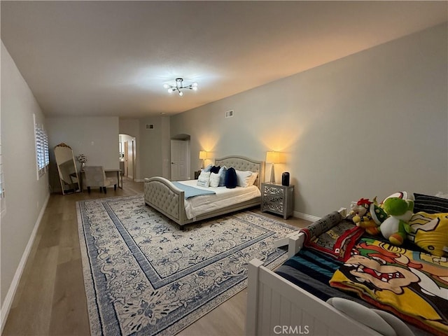 23 Ponte Sonata, Lake Elsinore, CA 92532 - bedroom featuring wood finished floors and baseboards