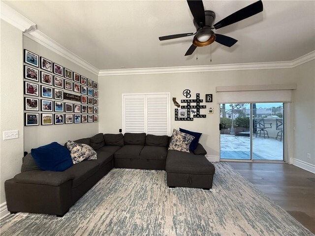 23 Ponte Sonata, Lake Elsinore, CA 92532 - living room featuring crown molding, wood finished floors, ceiling fan, and baseboards