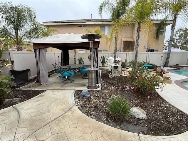 23 Ponte Sonata, Lake Elsinore, CA 92532 - view of patio with a gazebo and a fenced backyard