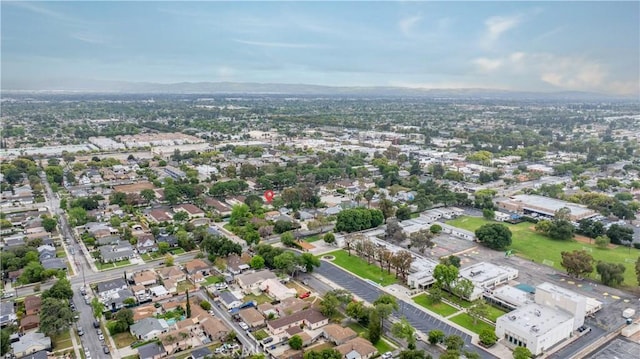 aerial overview of property's location with nearby suburban area