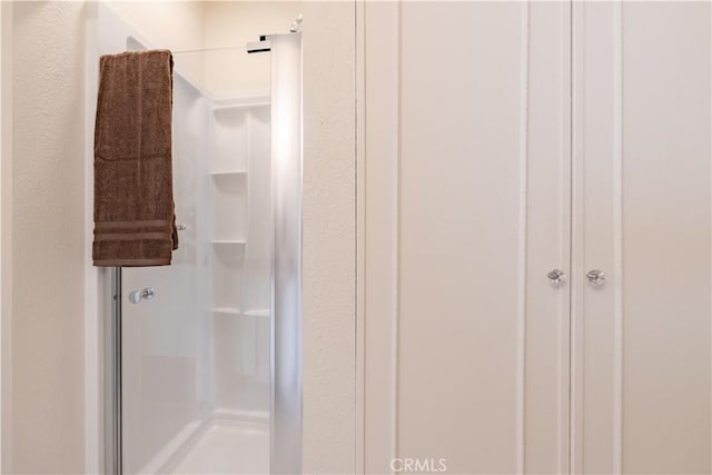 full bathroom with a stall shower