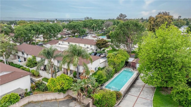 aerial perspective of suburban area with a pool area