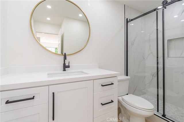 full bathroom with toilet, a marble finish shower, vanity, and recessed lighting