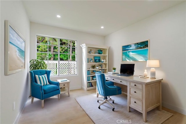 home office with baseboards, light wood-style floors, and recessed lighting