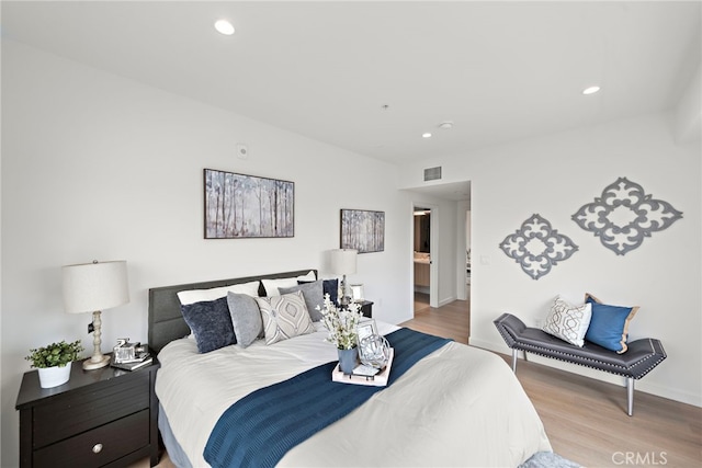 321 S Oxford Ave Unit 603, Los Angeles, CA 90020 - bedroom featuring wood finished floors, recessed lighting, and baseboards