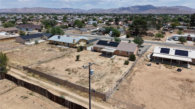 aerial view of residential area with mountains