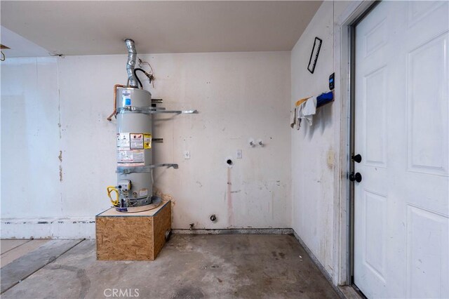 garage featuring strapped water heater