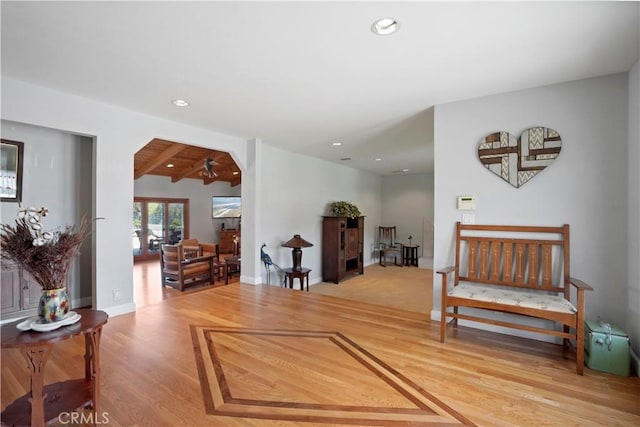 living room with ceiling fan, recessed lighting, and wood finished floors