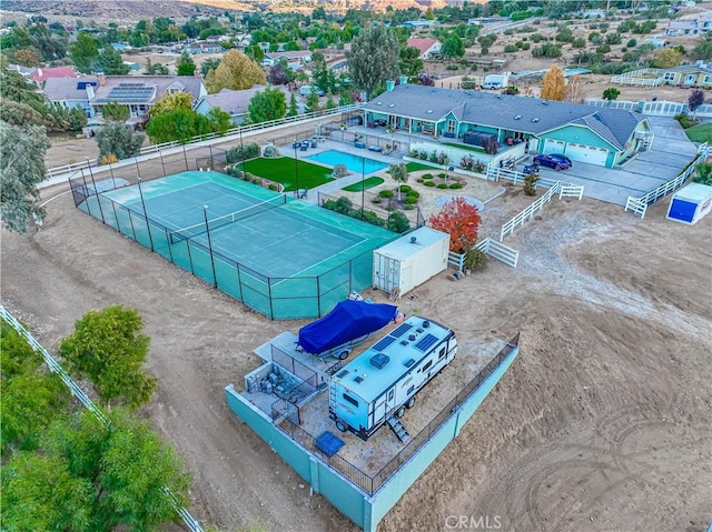 view of subject property featuring a pool area