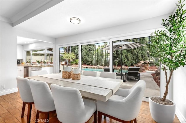 26351 Tarrasa Ln, Mission Viejo, CA 92691 - dining space with light wood-style flooring and baseboards