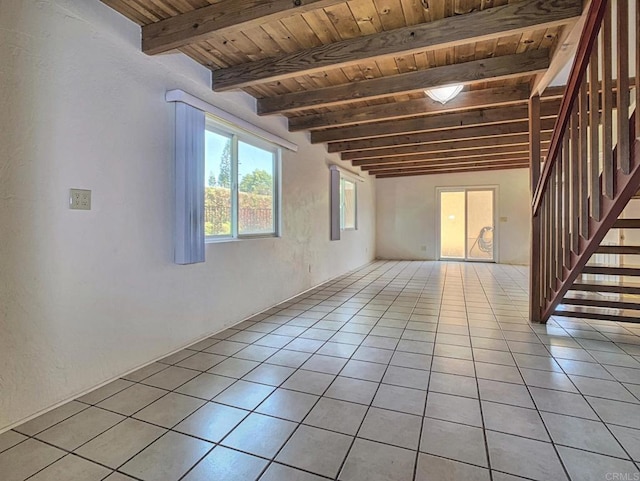 161 Twin Oaks Cir, Chula Vista, CA 91910 - unfurnished living room with wood ceiling, stairs, beamed ceiling, and light tile patterned floors