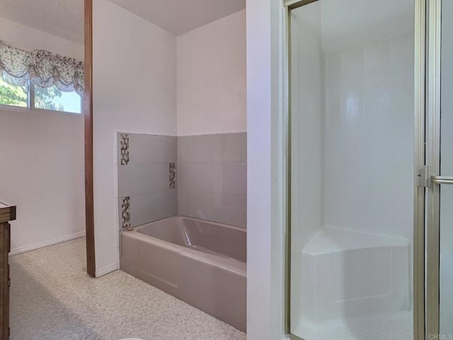 161 Twin Oaks Cir, Chula Vista, CA 91910 - full bathroom featuring a garden tub, a shower stall, baseboards, and vanity
