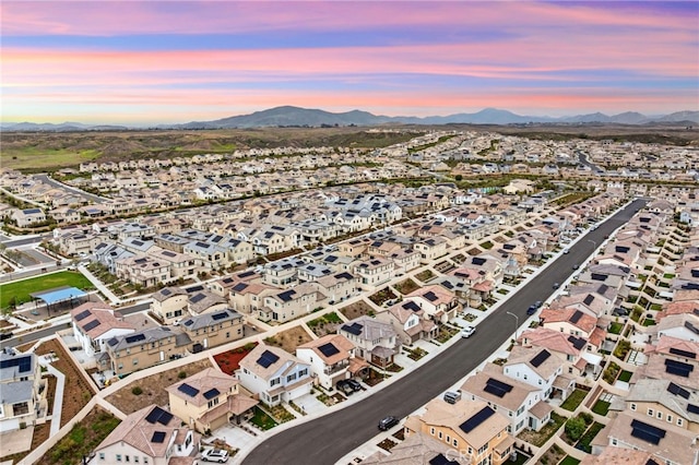aerial view at dusk of a mountain view and a residential view